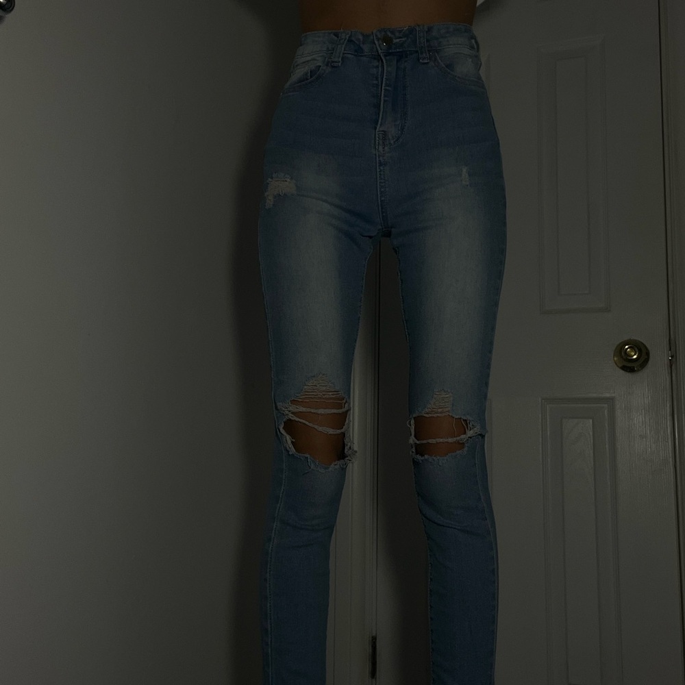 High-Waisted Distressed Denim Jeans